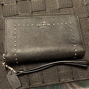 Coach dual zip wallet. Black leather with silver studs.